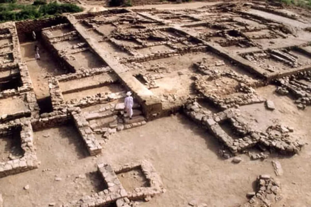 Excavated ruins of Dholavira Harappan city in Kutch showing ancient stone structures and water reservoirs