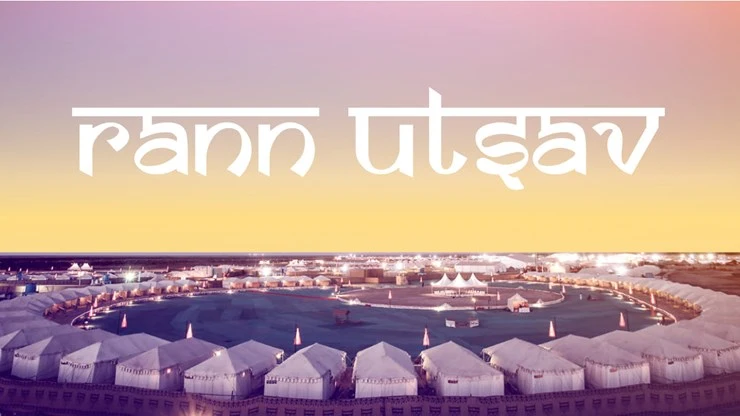 Well-lit luxury tents lined up at Tent City during Rann Utsav in Dhordo, Kutch with cultural ambiance