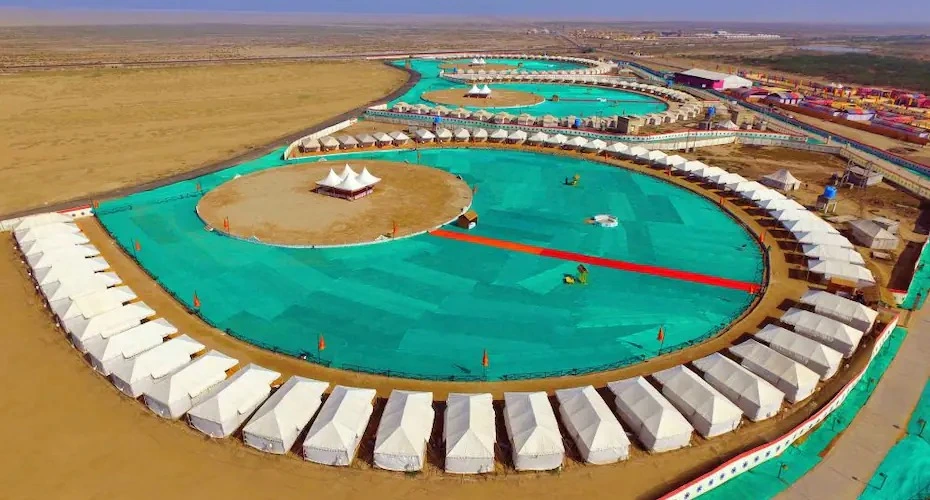 Traditional style tents in Tent City Dhordo, Kutch during Rann Utsav with colorful lighting and festive setup